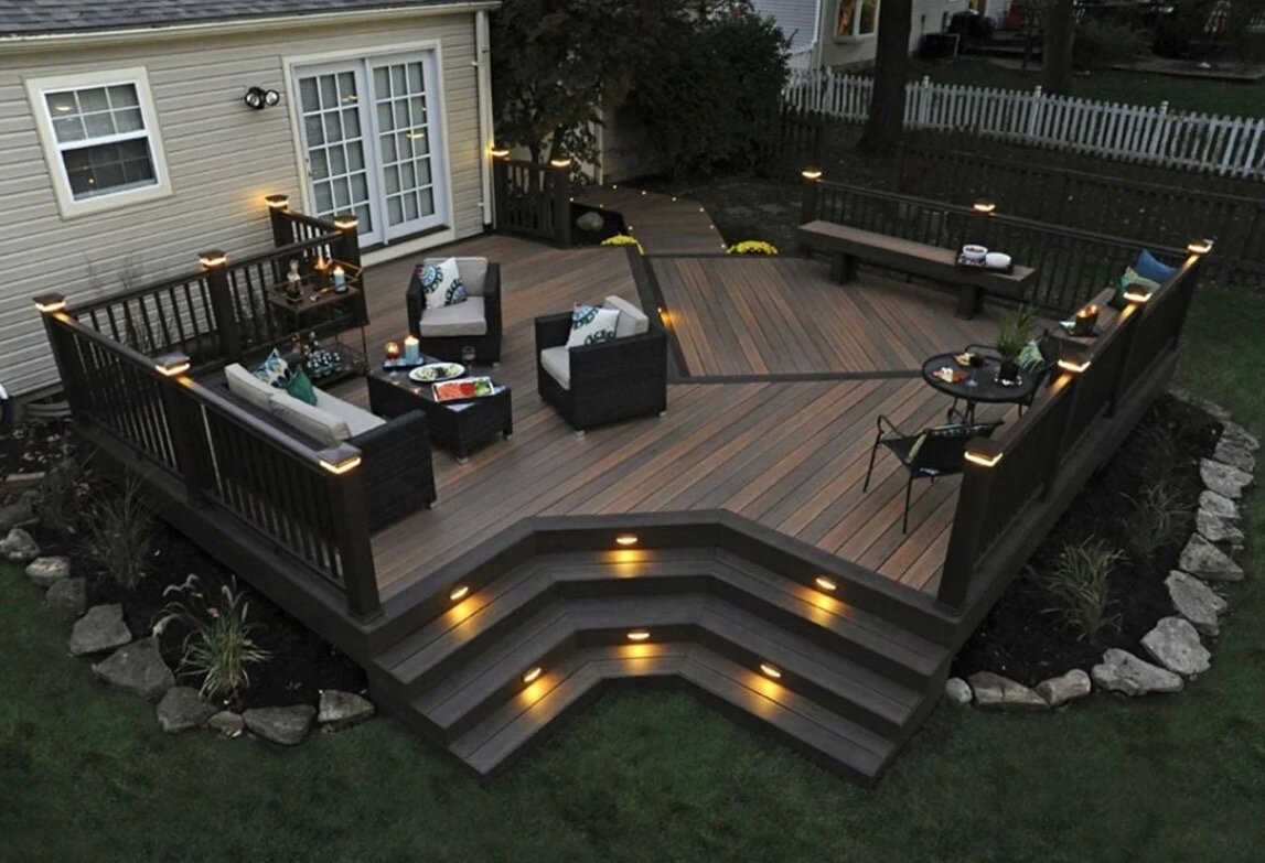 TrueStone deck build — completed outdoor living space with lighting